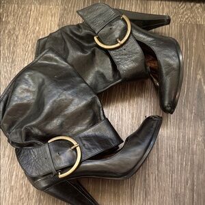 Chic Black Leather Heeled Boots with Gold Buckles